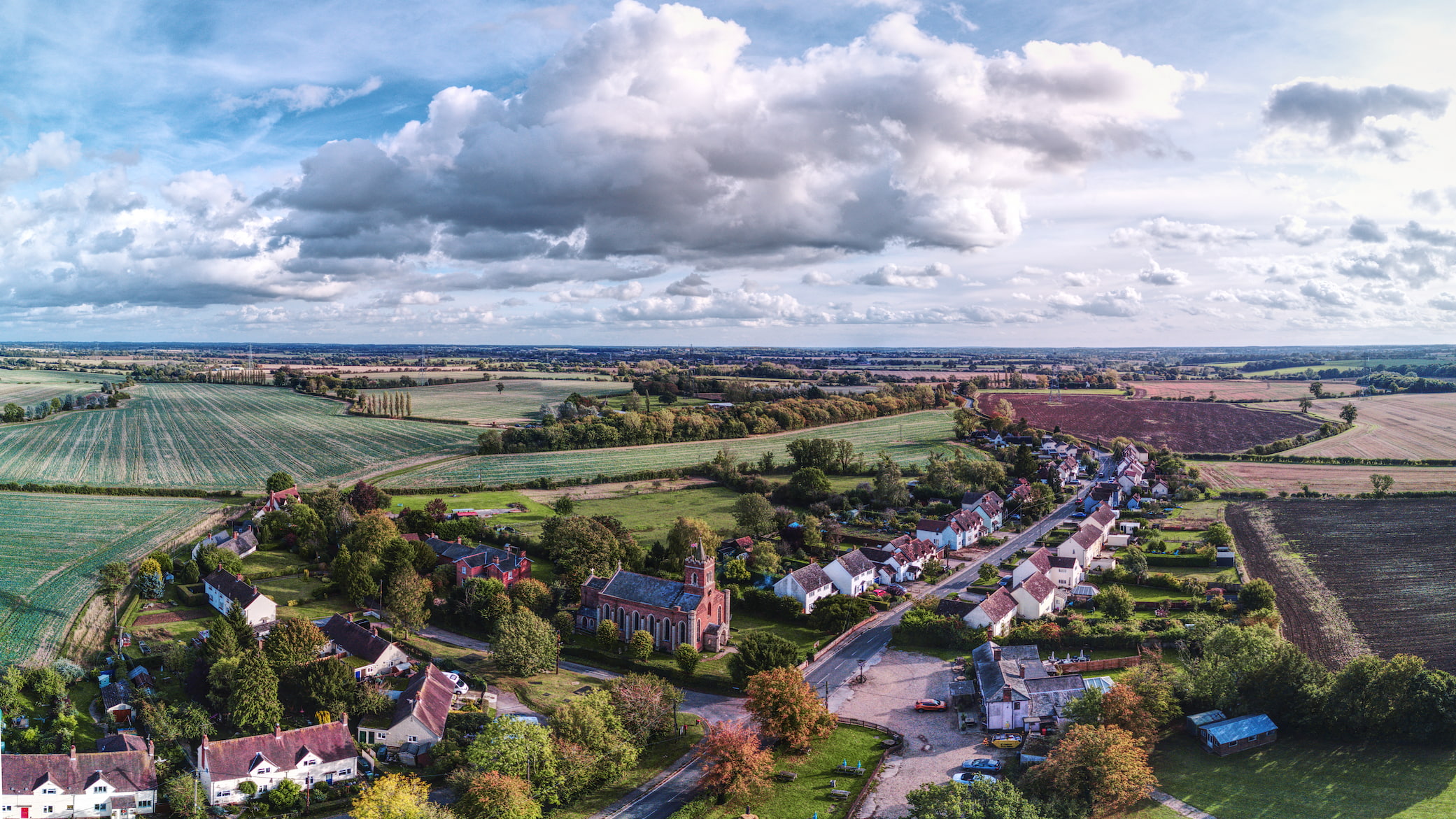 Aerial photo of braintree with trees, fields and houses