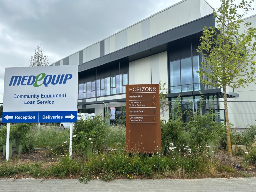 photo of the Medequip office, Medequip arrivals sign and Horizon 120 directory signpost