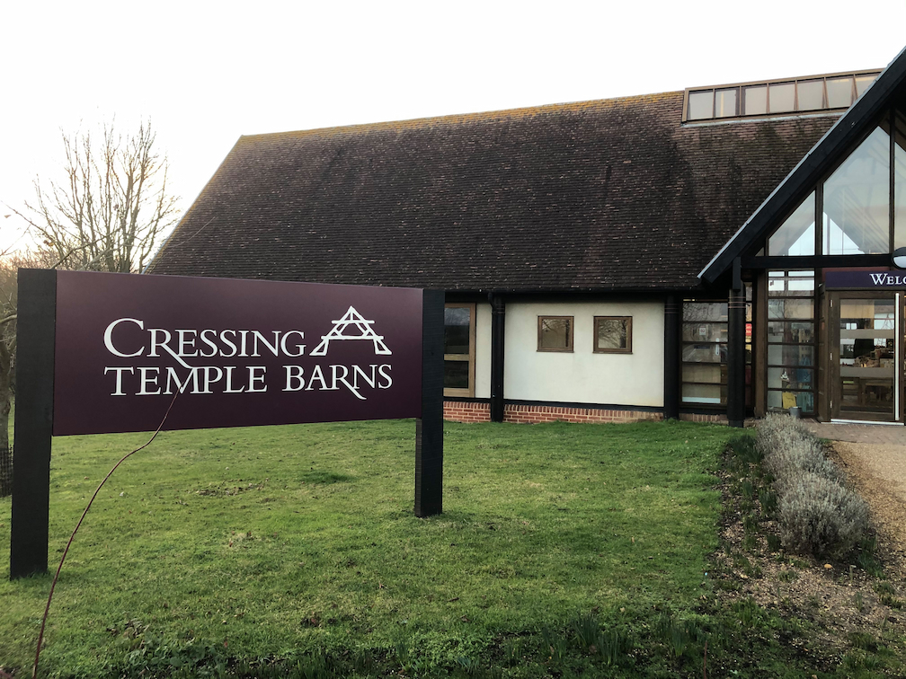 outside of cressing temple barns building and sign